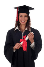 female graduate smiling holding a degree